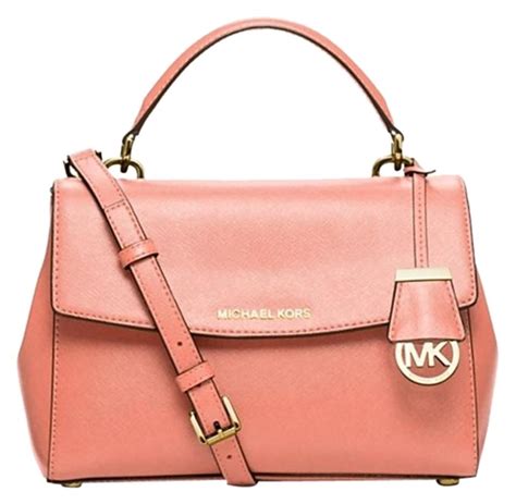 michael kors peach purse bolt|Michael Kors bag.